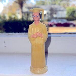 Vintage thin hard plastic female graduate holding diploma cake topper